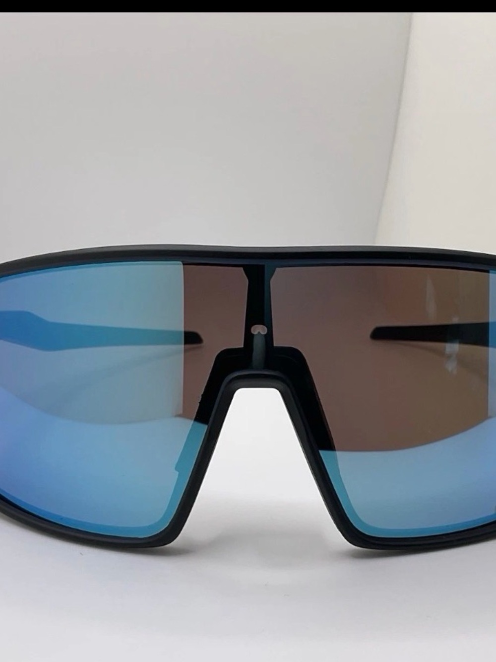 Oakley Black Shield Sunglasses with Blue Mirrored Lenses